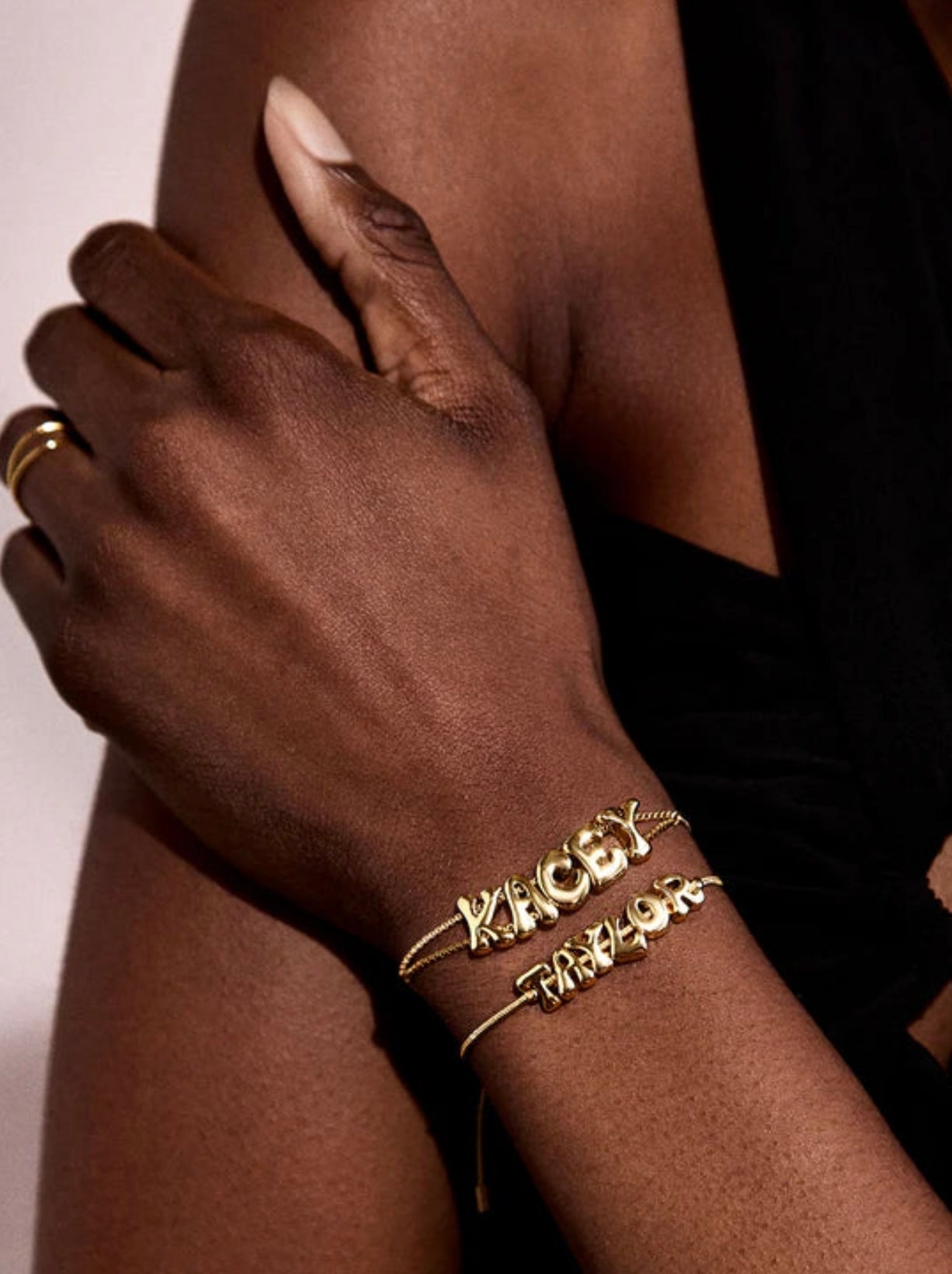 TWO BUBBLE LETTER BRACELETS