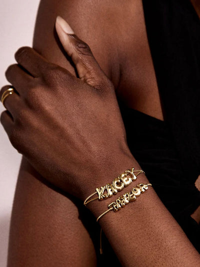 TWO BUBBLE LETTER BRACELETS