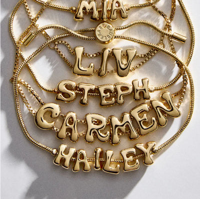 TWO BUBBLE LETTER BRACELETS